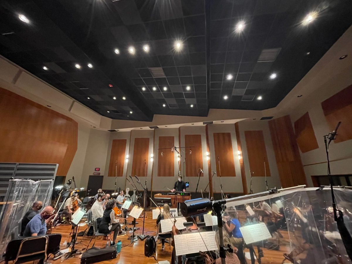 Conducting an orchestral recording session